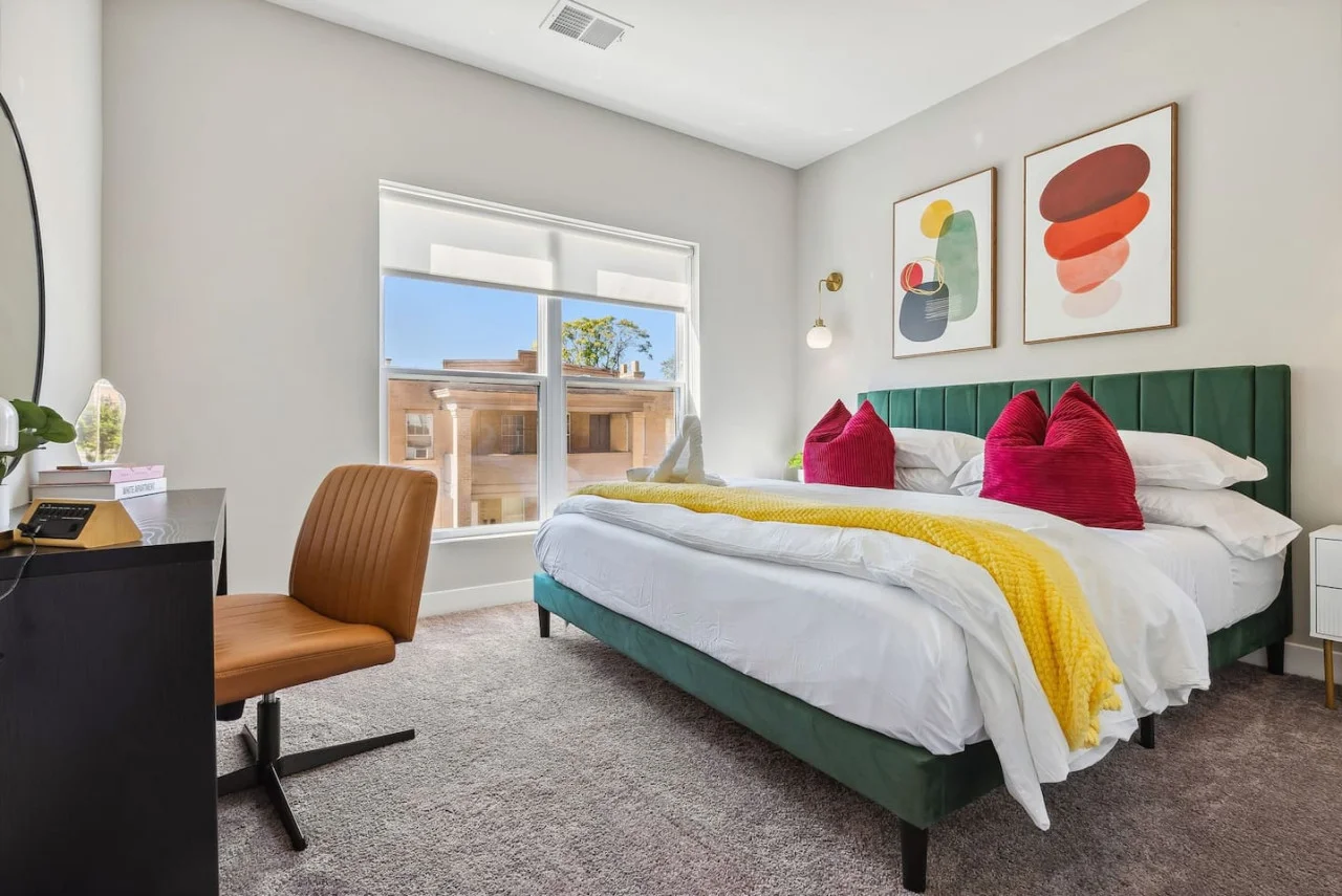 The king bed is the centerpiece of the room, offering a plush and inviting space where you can rest and recharge.
