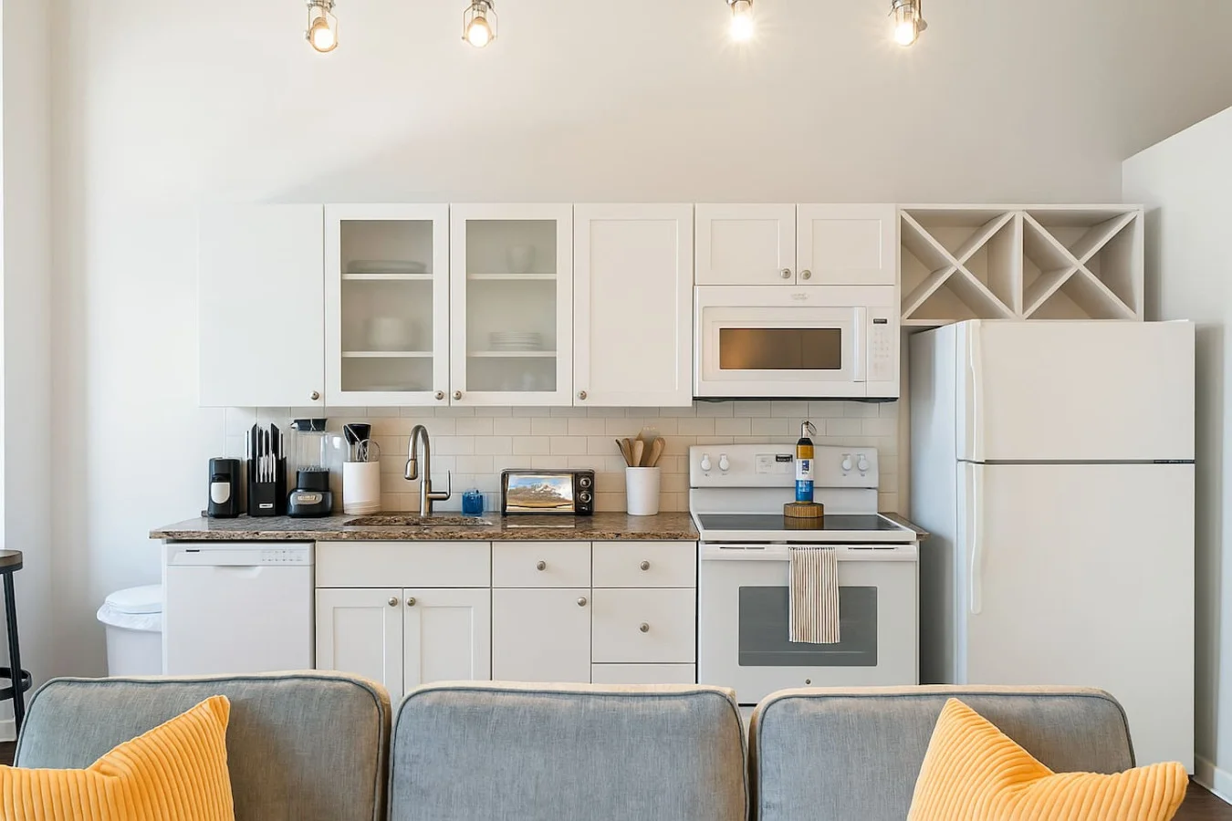 The kitchen invites you to experiment with new recipes, offering a stylish and practical space to cook and create.