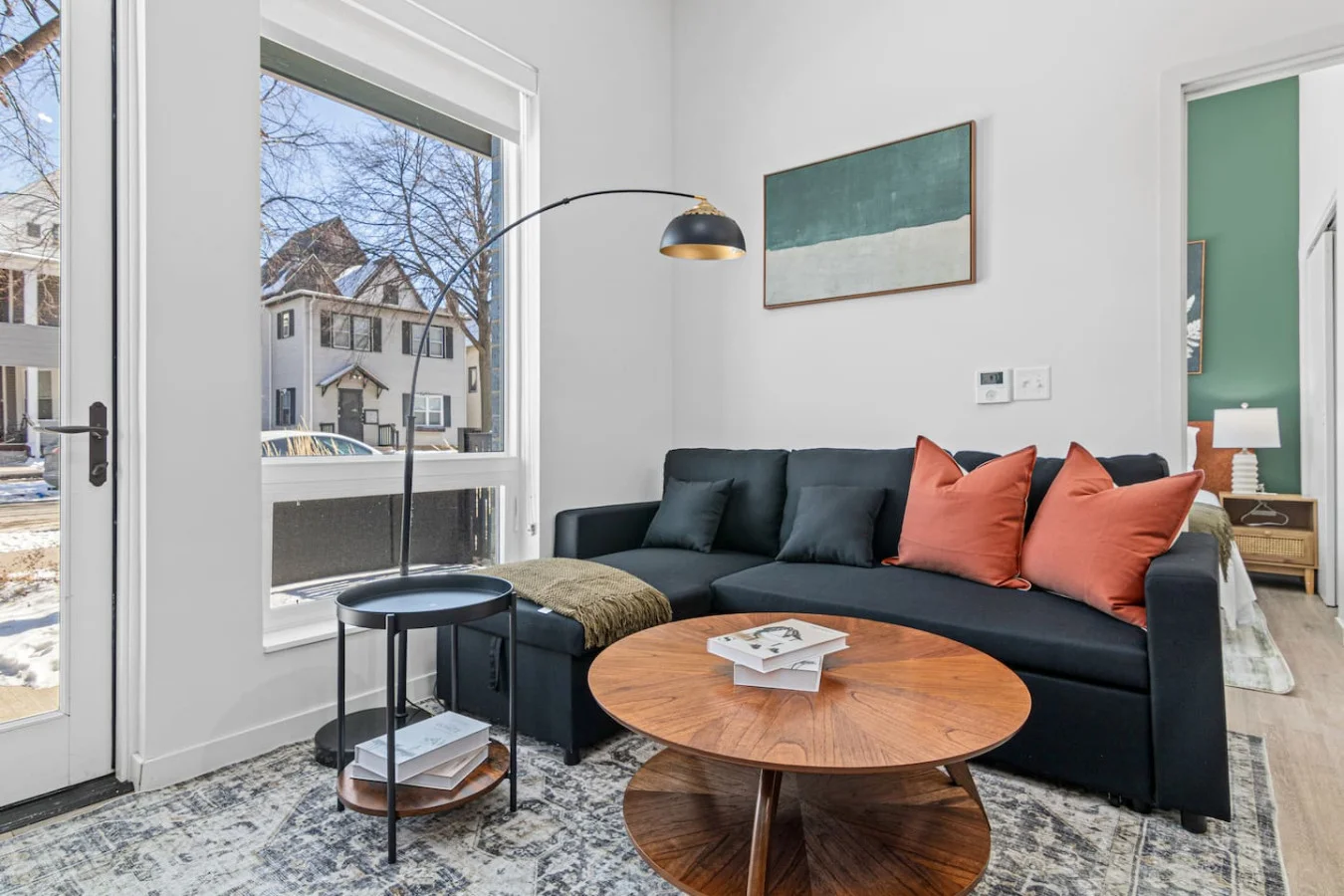 As you take a seat in the living room, the comfortable furniture and tasteful design make it easy to unwind.