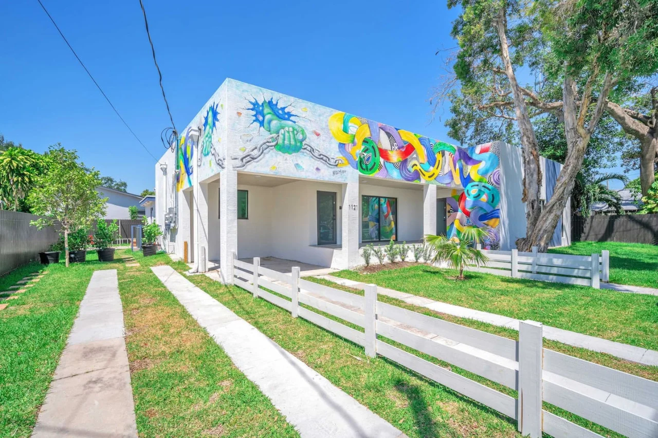 Welcoming facade of the home, showcasing beautiful architecture and a well-maintained exterior, perfect for a relaxing stay.