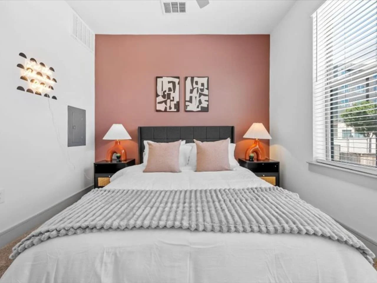 Spacious bedroom with stylish decor, perfect for unwinding after a day of exploring the local area.