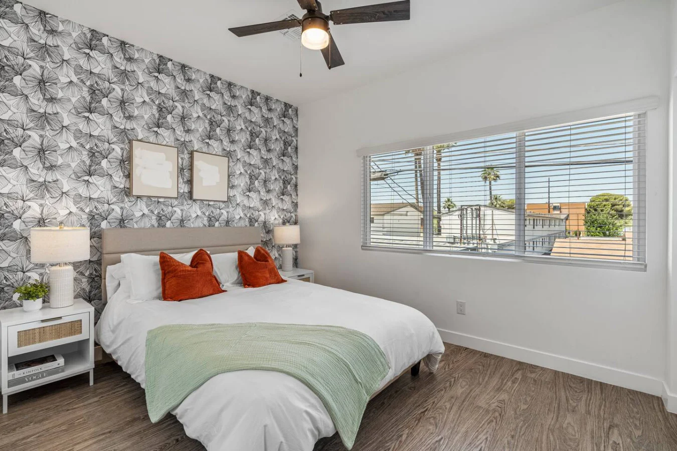 You feel a sense of serenity as you step into the queen bedroom, where the elegant design and comfortable bed invite relaxation.