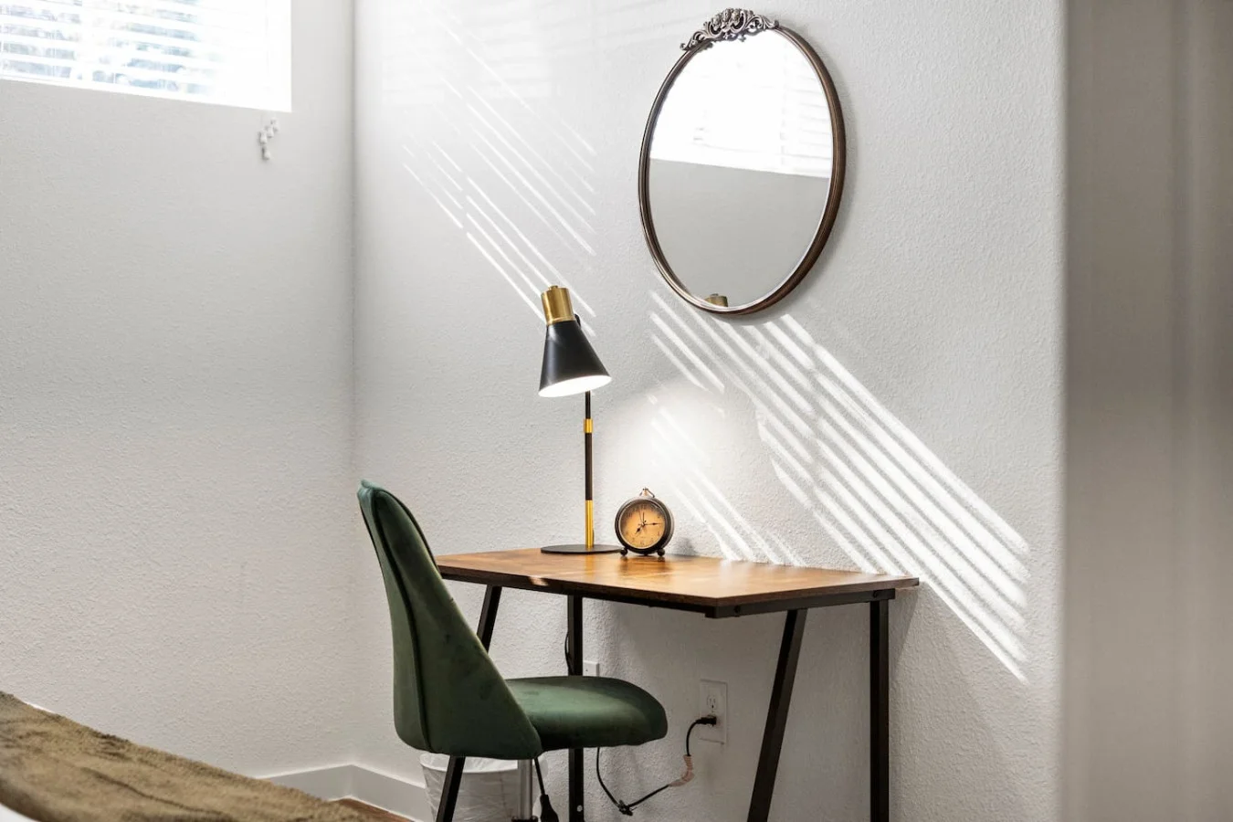 This cozy workspace with warm lighting, and a creative wall display, perfect for productivity.