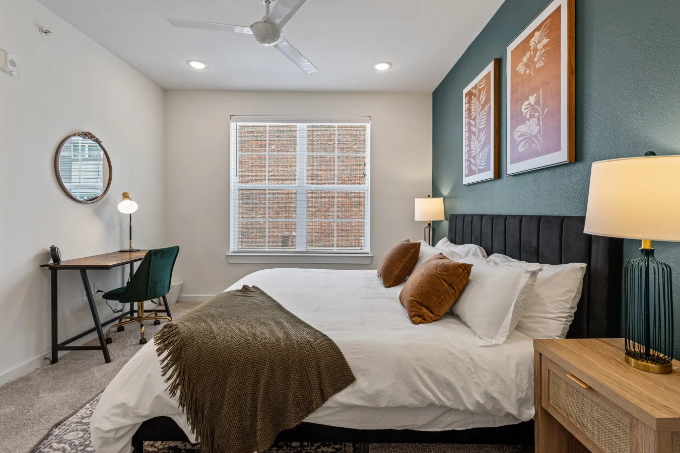 Relax in style in this cozy, modern bedroom featuring a plush king-size bed, chic decor, and a dedicated workspace — perfect for both rest and remote work.