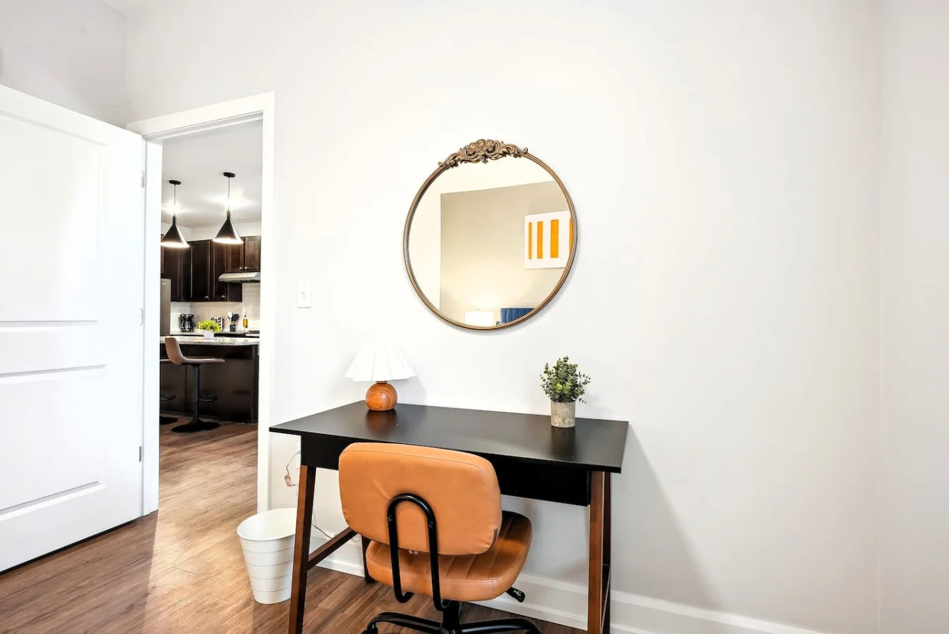 This cozy workspace area is perfect for productivity. Enjoy natural light, a comfortable chair, and a stylish desk setup. Ideal for work-from-home needs or planning your Dallas adventures.