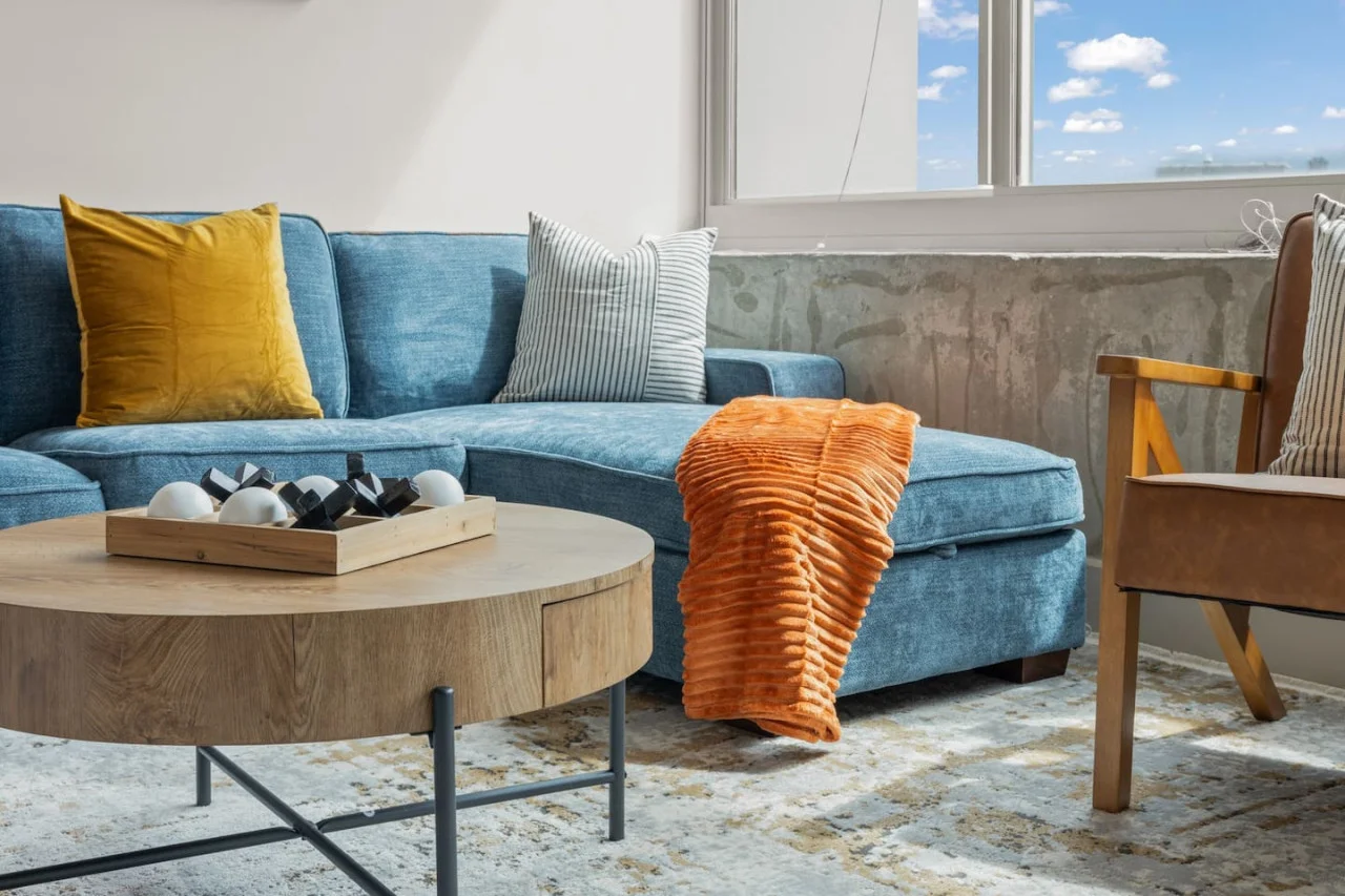 As you take a seat in the living room, the comfortable furniture and tasteful design make it easy to unwind.
