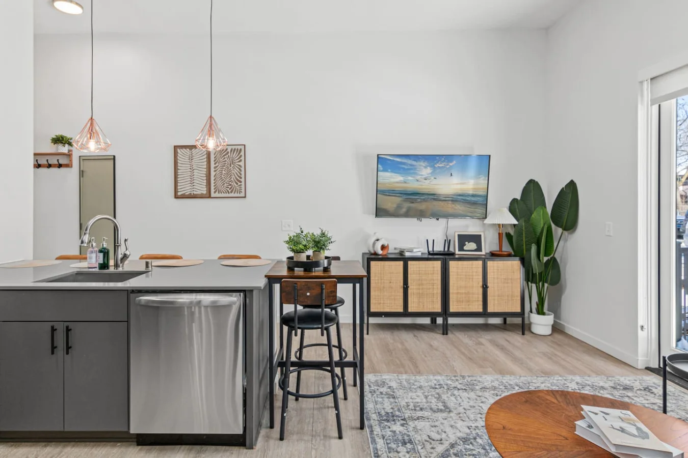 You feel a sense of peace as you step into the living room , with its inviting decor and soothing tones.