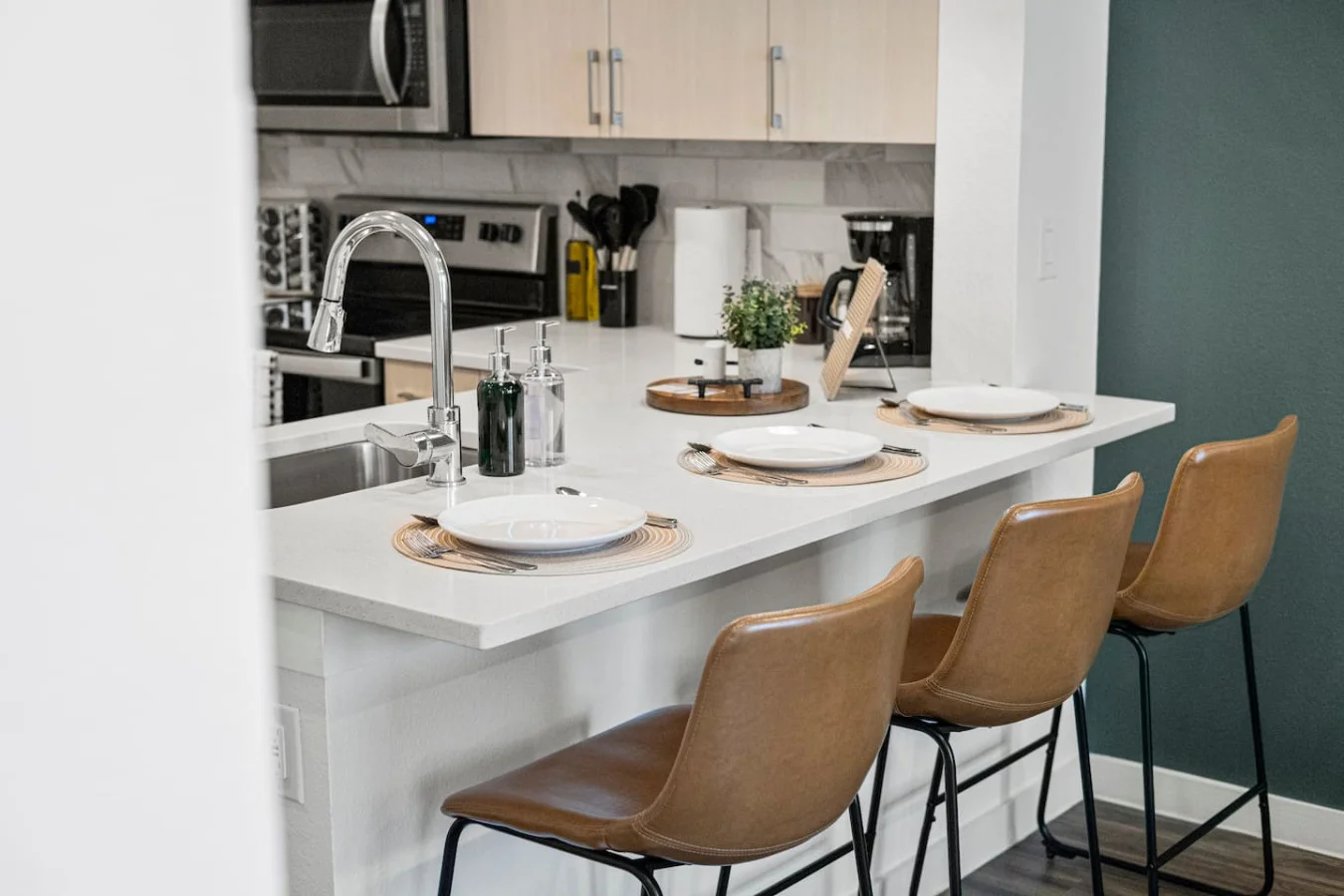 As you take your seat, the dining room's sophisticated design sets the stage for memorable meals and conversations.