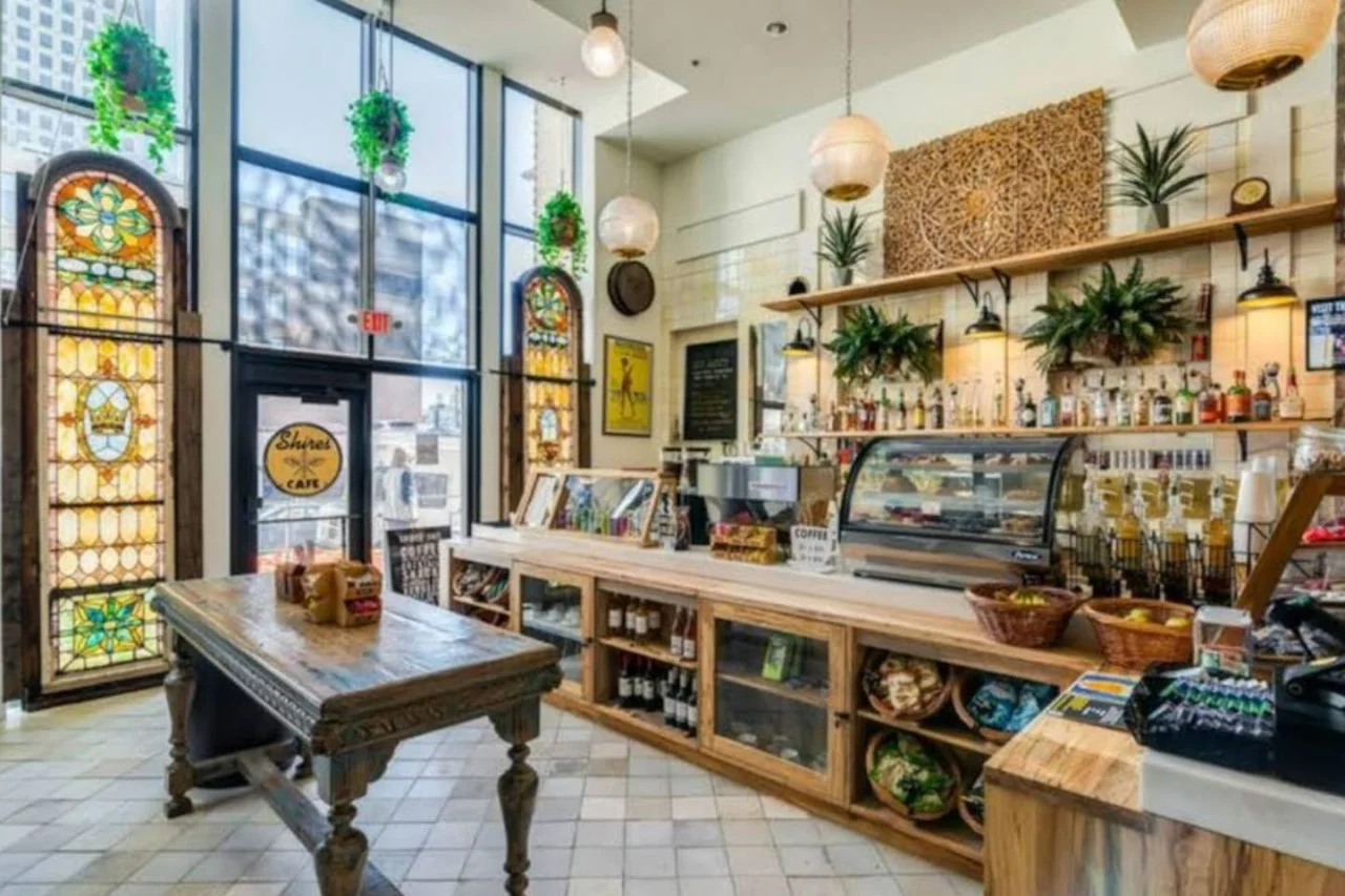 As you approach the home bar, the elegant layout and well-stocked shelves make it the ideal spot to relax.