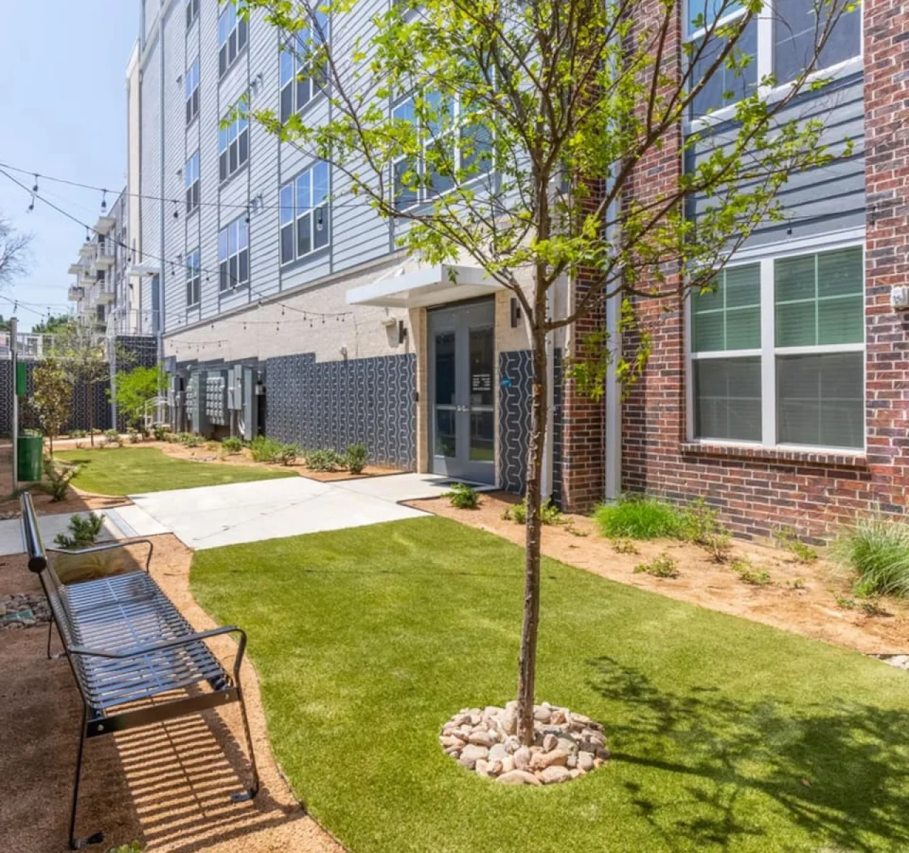 The house’s exterior is a blend of modern and classic design elements, creating a welcoming and stylish facade.