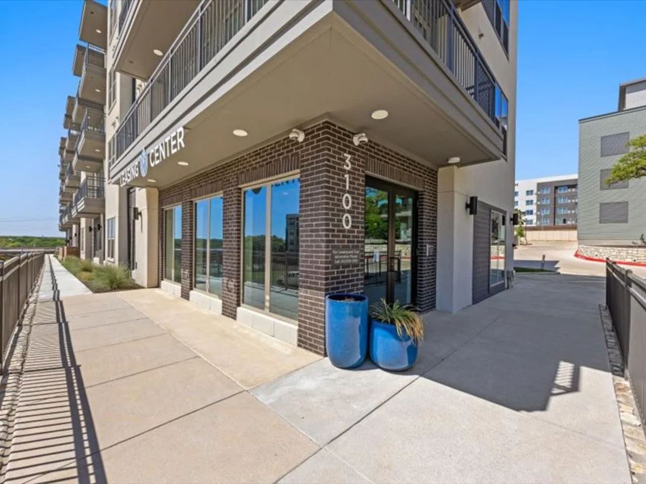 The house’s exterior is a blend of modern and classic design elements, creating a welcoming and stylish facade.