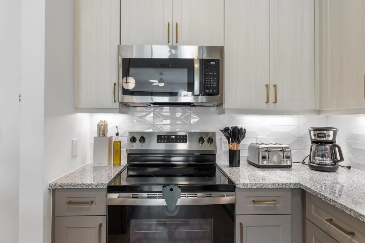 As you step into the kitchen, the clean lines and functional design make you eager to start cooking your favorite dishes.