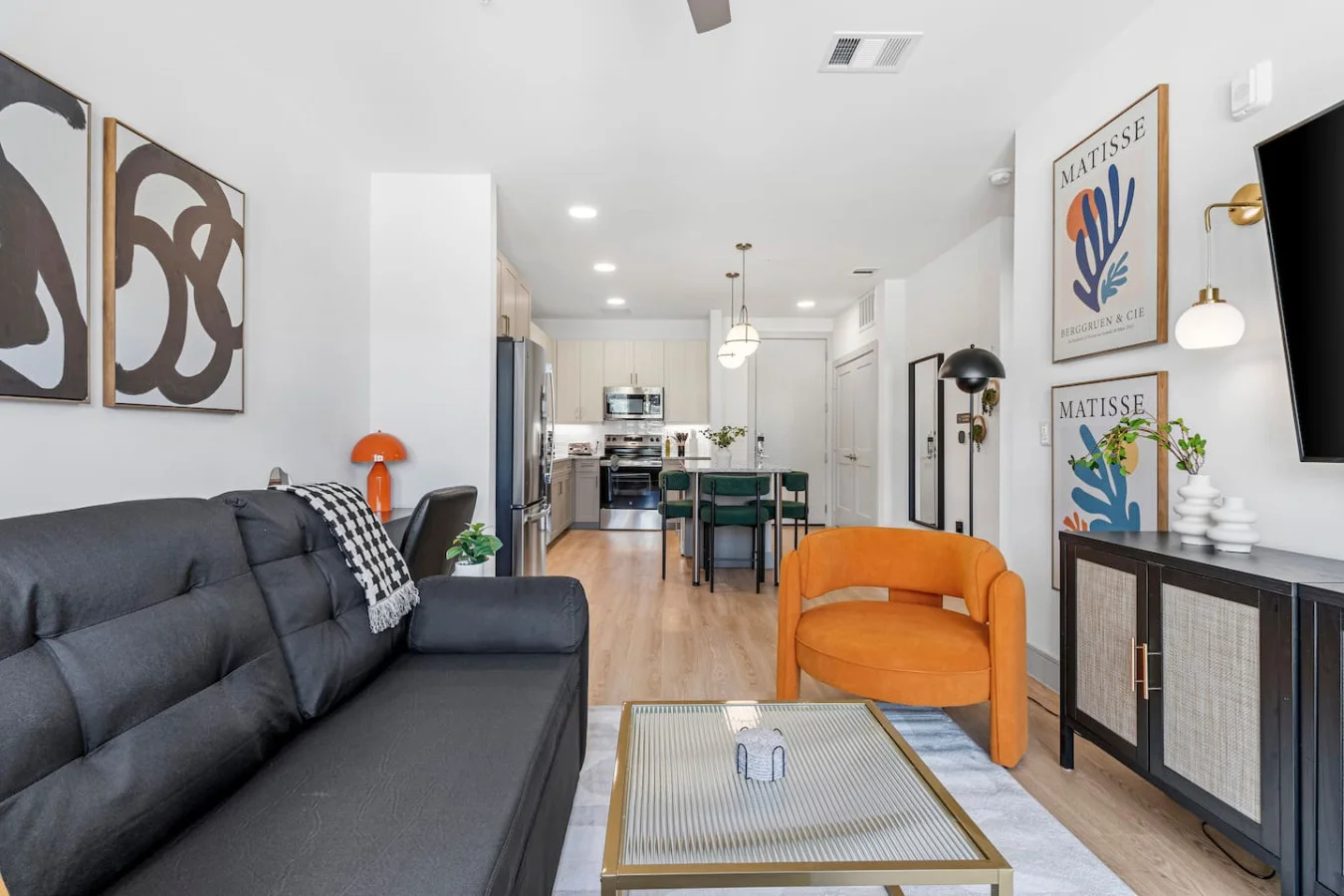 Comfortable seating and thoughtfully designed interiors make this living room perfect for relaxation.