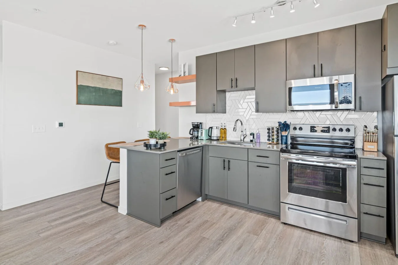 The kitchen invites you to experiment with new recipes, offering a stylish and practical space to cook and create.