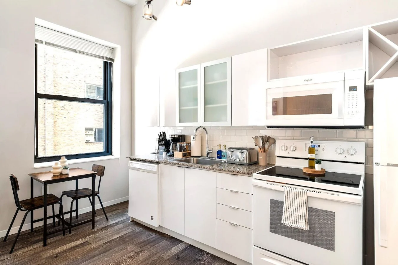 As you approach kitchen the elegant layout and well-stocked shelves make it the ideal spot to relax.