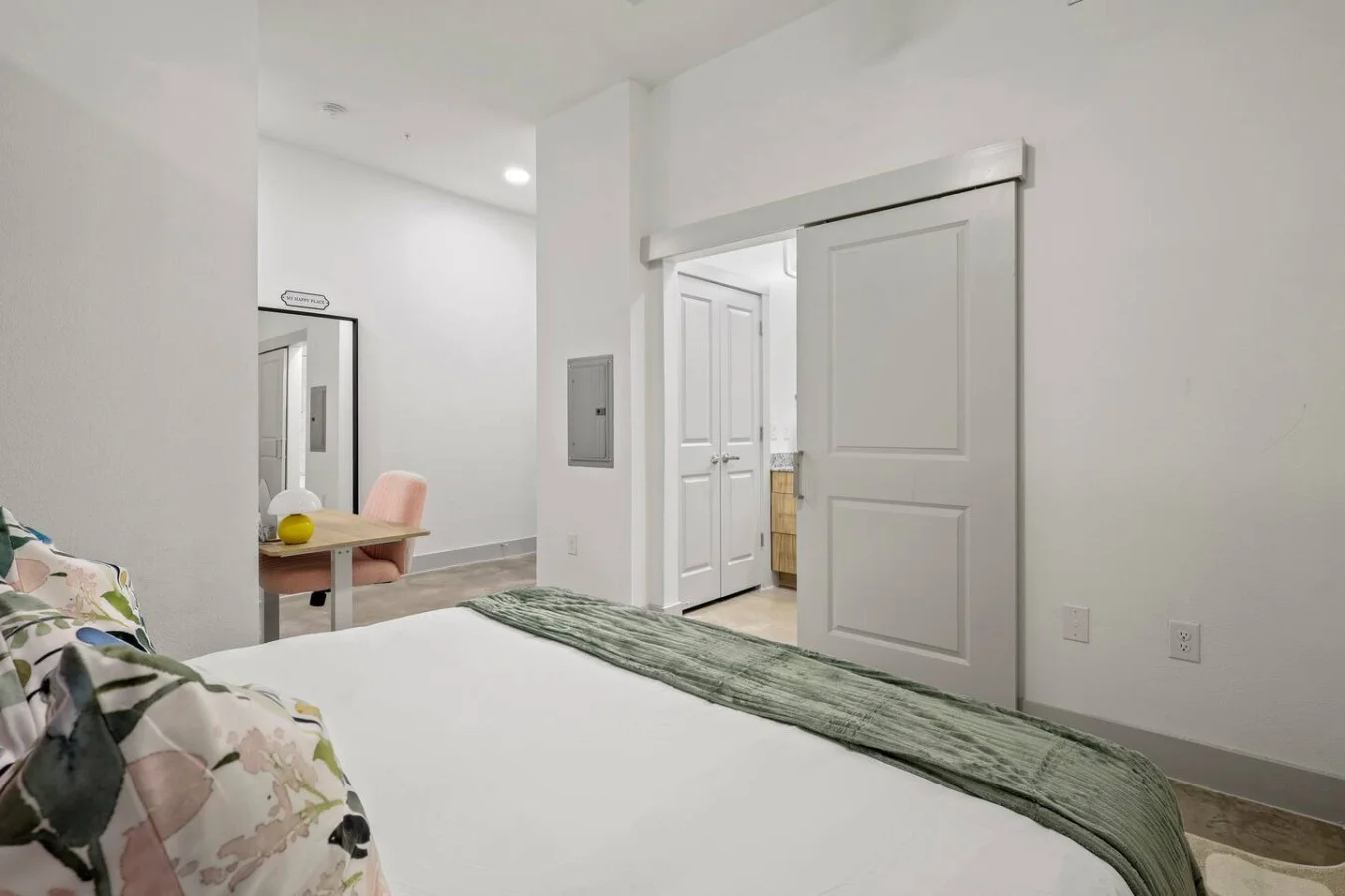 Spacious bedroom with stylish decor, perfect for unwinding after a day of exploring the local area.