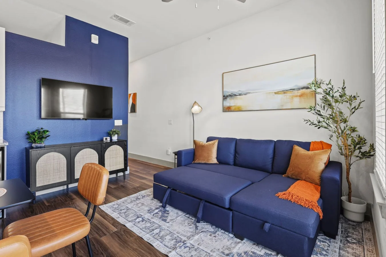 Relax in the living room and watch your favorite shows, lounging is a great way to unwind after a long day.
