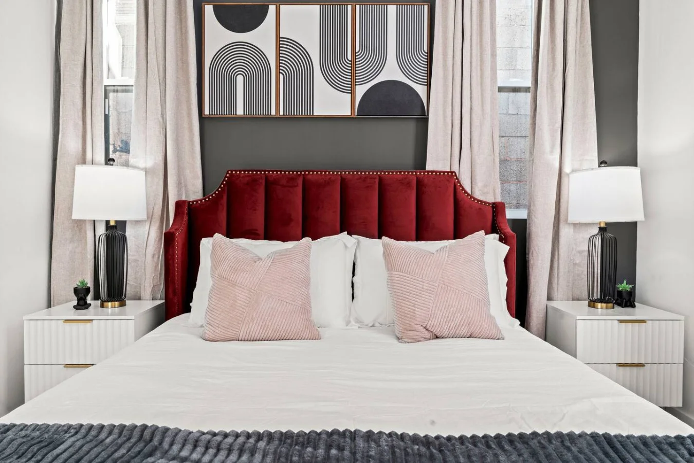 Luxe Bedroom with Queen Size Bed, Side Tables, and Table Lamps. Ample Natural Lighting with Blinds & Blackout Curtains for a restful sleep
