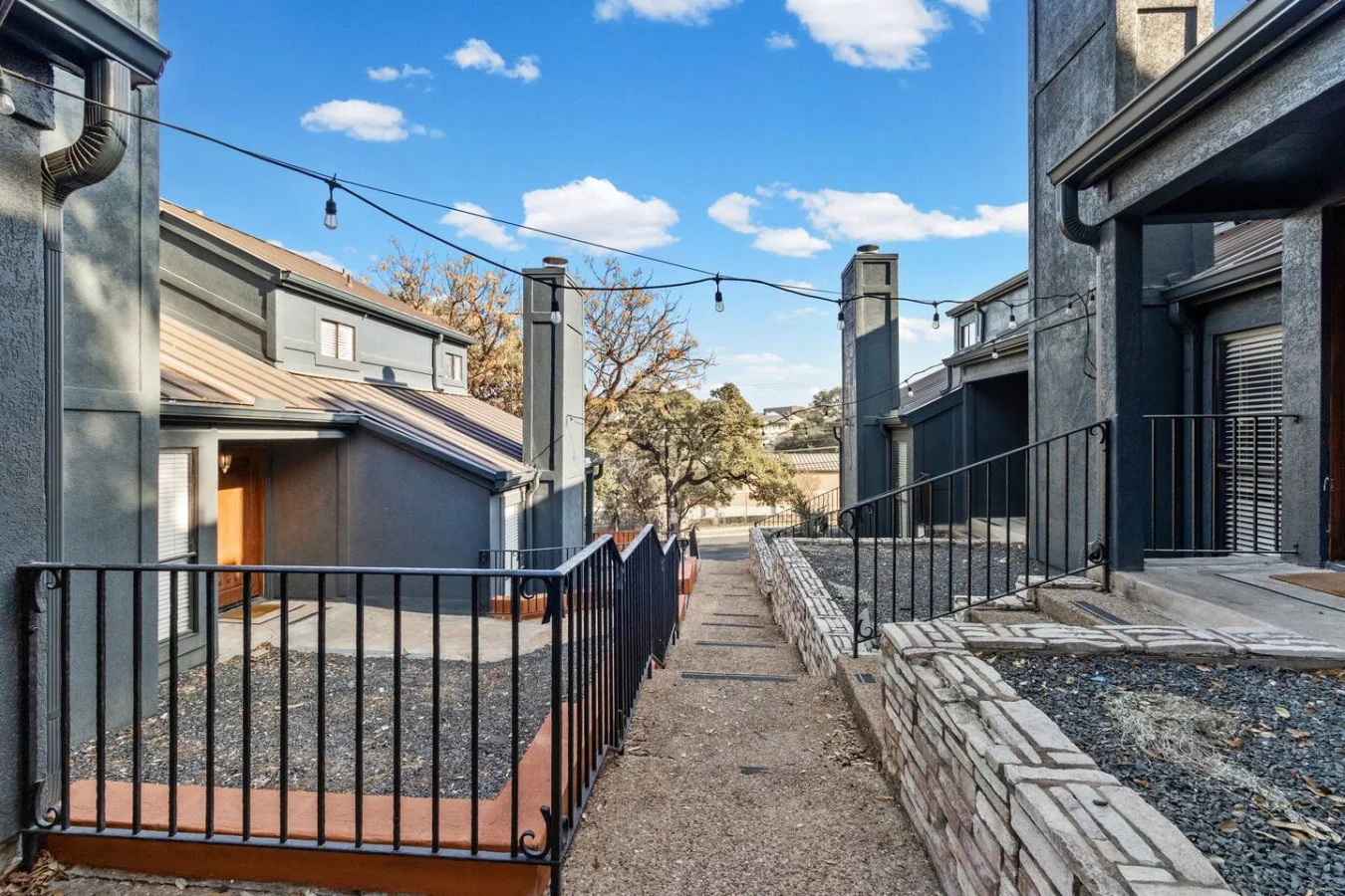 Private walkway within a quiet townhouse community