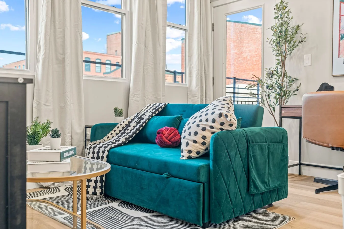 You feel a sense of peace as you step into the living room , with its inviting decor and soothing tones.