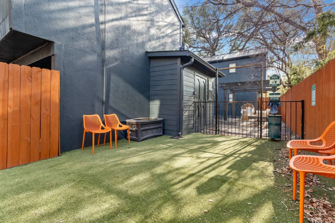 Fully fenced on-site dog park for pet guests