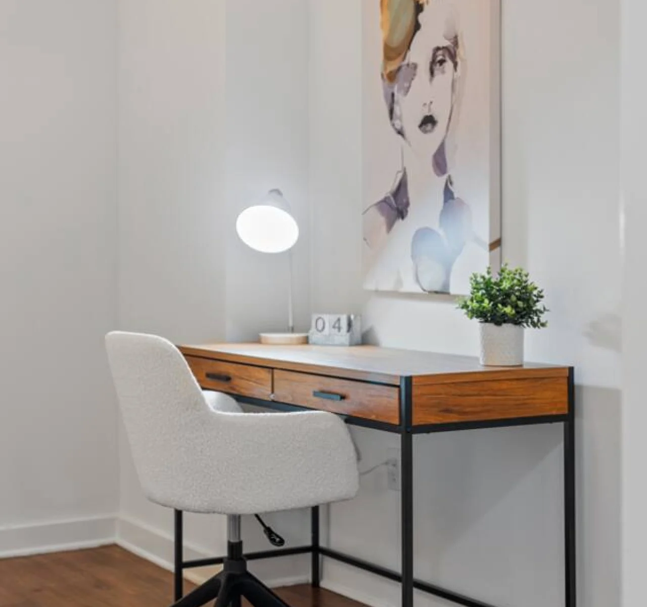 This cozy workspace in the master bedroom is perfect for productivity. Enjoy natural light, a comfortable chair, and a stylish desk setup. Ideal for work-from-home needs or planning your Dallas adventures.