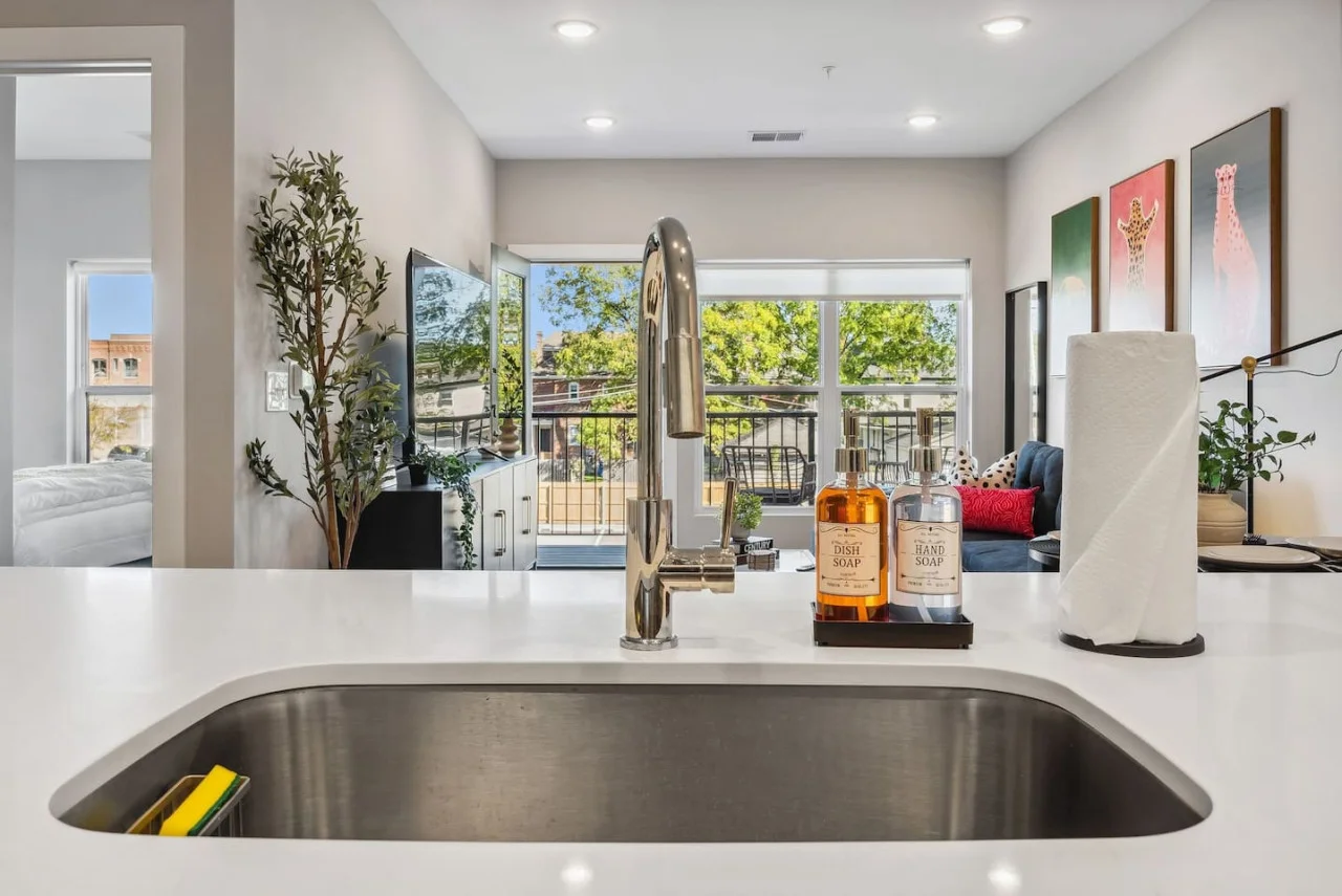 The kitchen’s open layout allows you to move freely as you prepare meals, with everything you need at your fingertips.