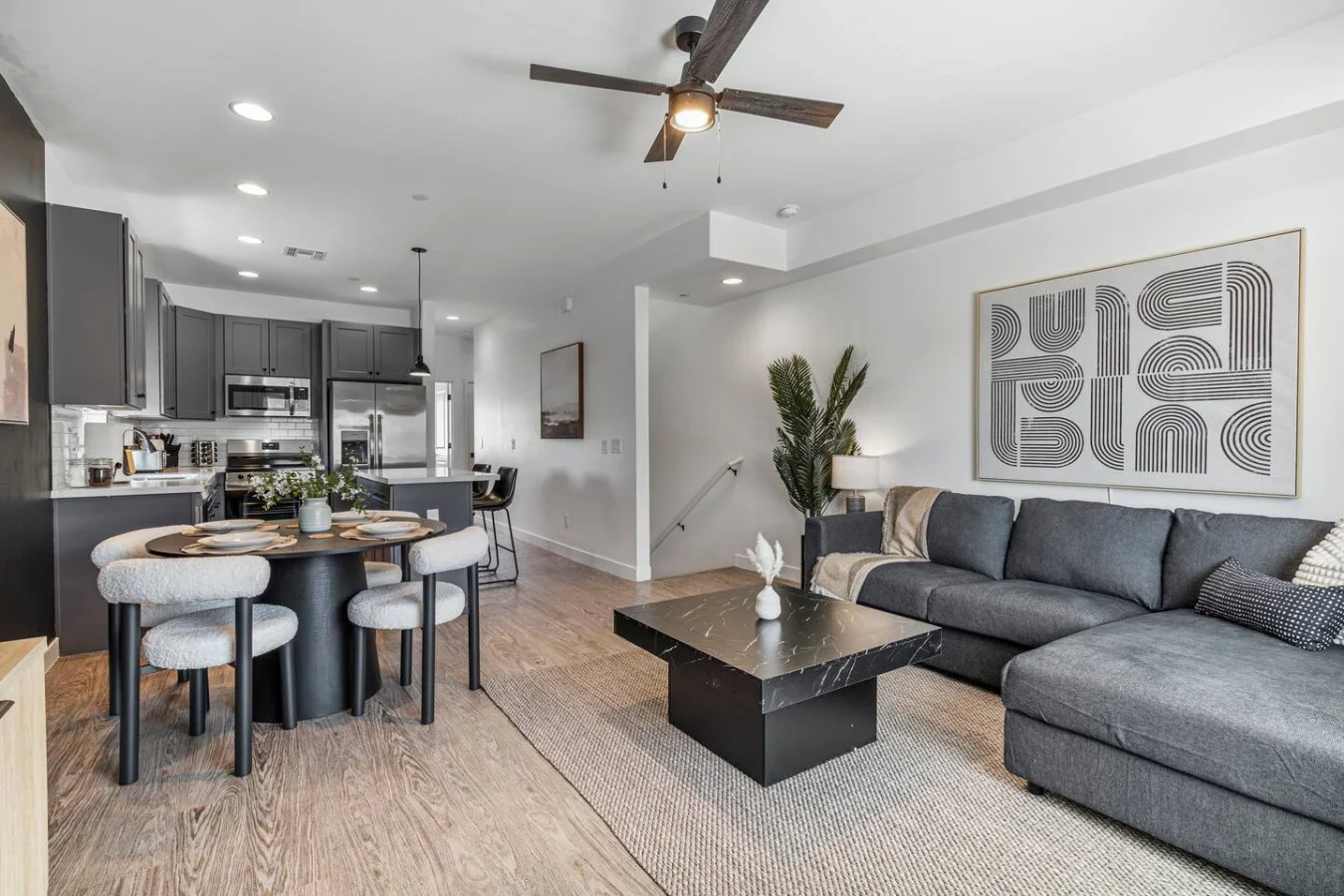 You feel at home as you settle into the living room, where the inviting atmosphere is perfect for lounging or entertaining.