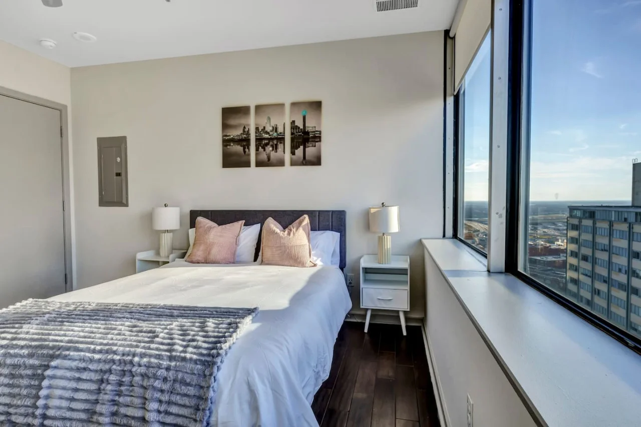 The bedroom’s serene ambiance invites you to relax, with a plush bed that promises a restful night's sleep.