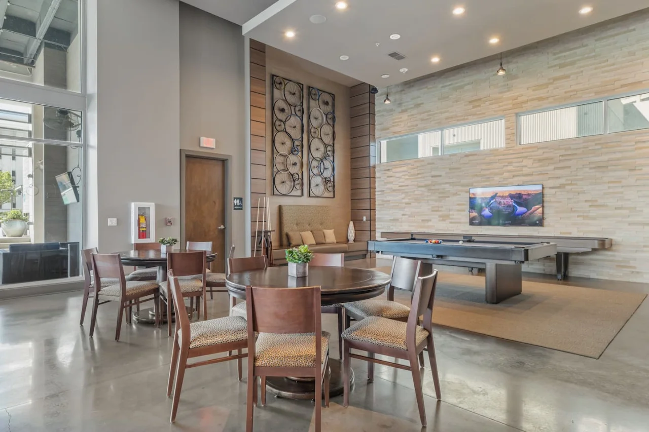 Relax in this warm, inviting space with wooden accents and cozy furnishings. You’ll love unwinding on the plush sofa, enjoying a good book or streaming your favorite shows in a serene atmosphere