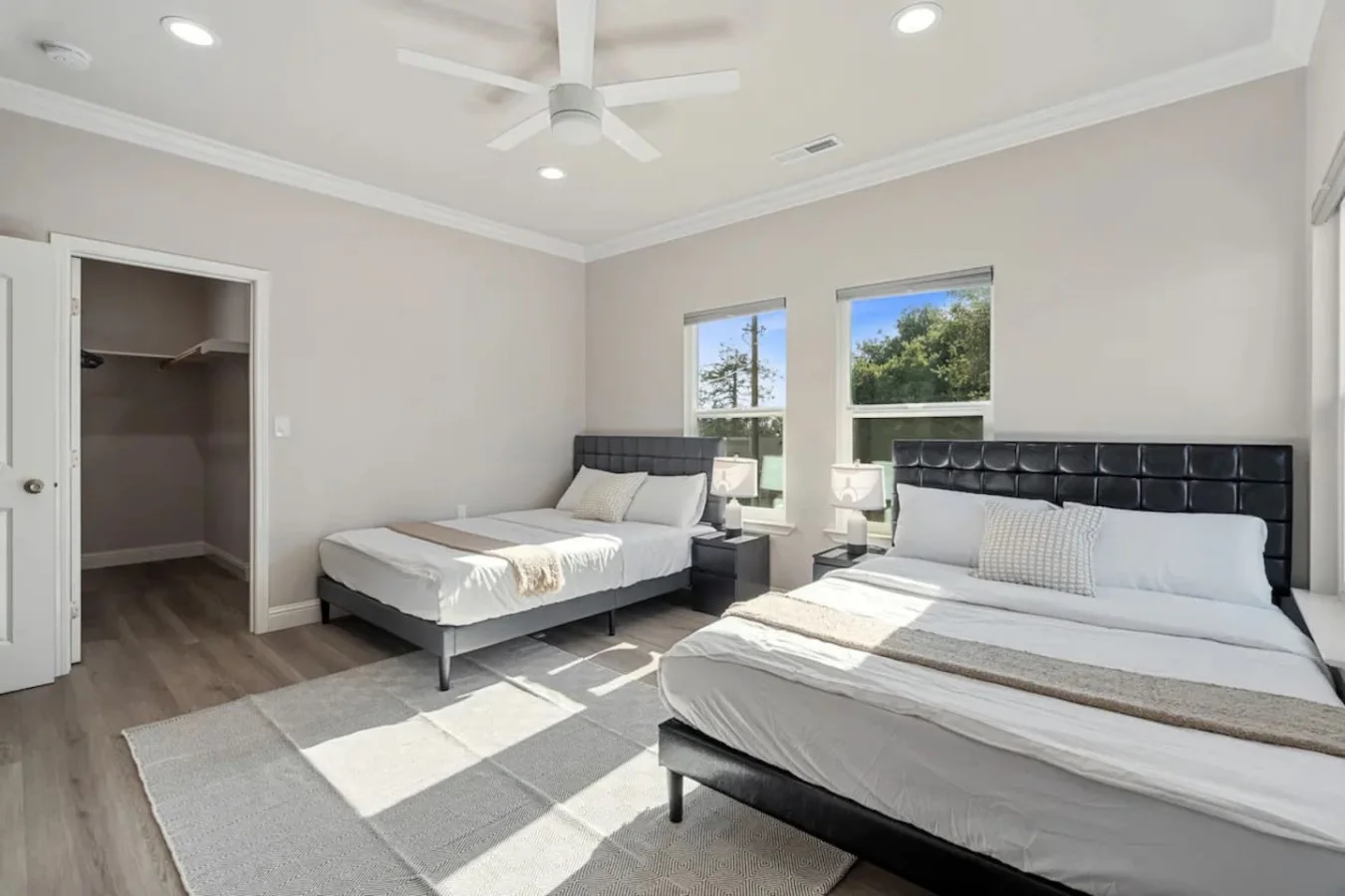 You feel enveloped in comfort as you relax on the queen bed, surrounded by a room designed for tranquility.