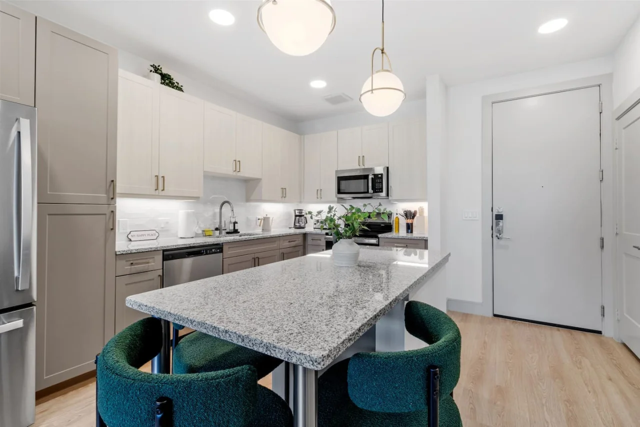 The spacious dining room invites you to savor every moment, whether enjoying a quiet meal or hosting a festive gathering.