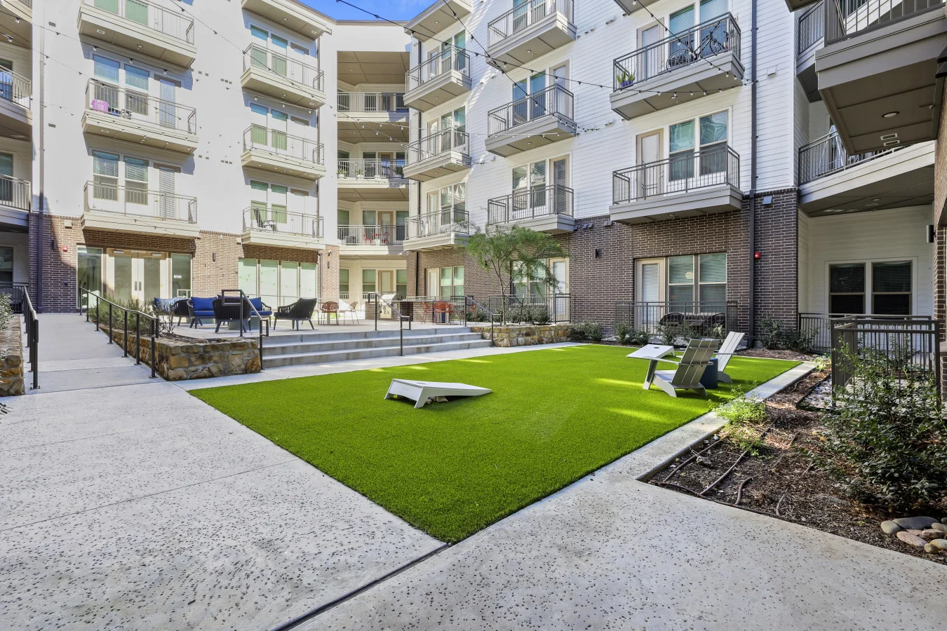 The outdoor areas’ plush seating beckons you to sink in and relax, surrounded by light and airy decor.
