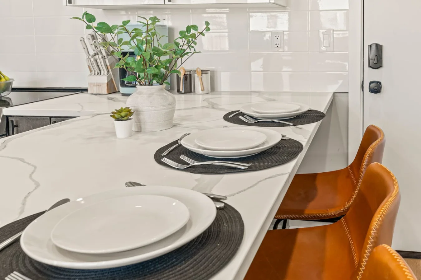 The dining area invites you to savor every moment, whether enjoying a quiet meal or hosting a festive gathering.