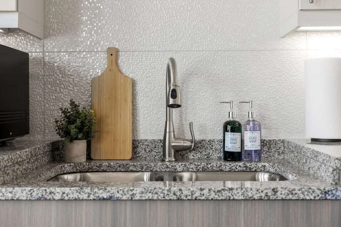 As you step into the kitchen, the clean lines and functional design make you eager to start cooking your favorite dishes.