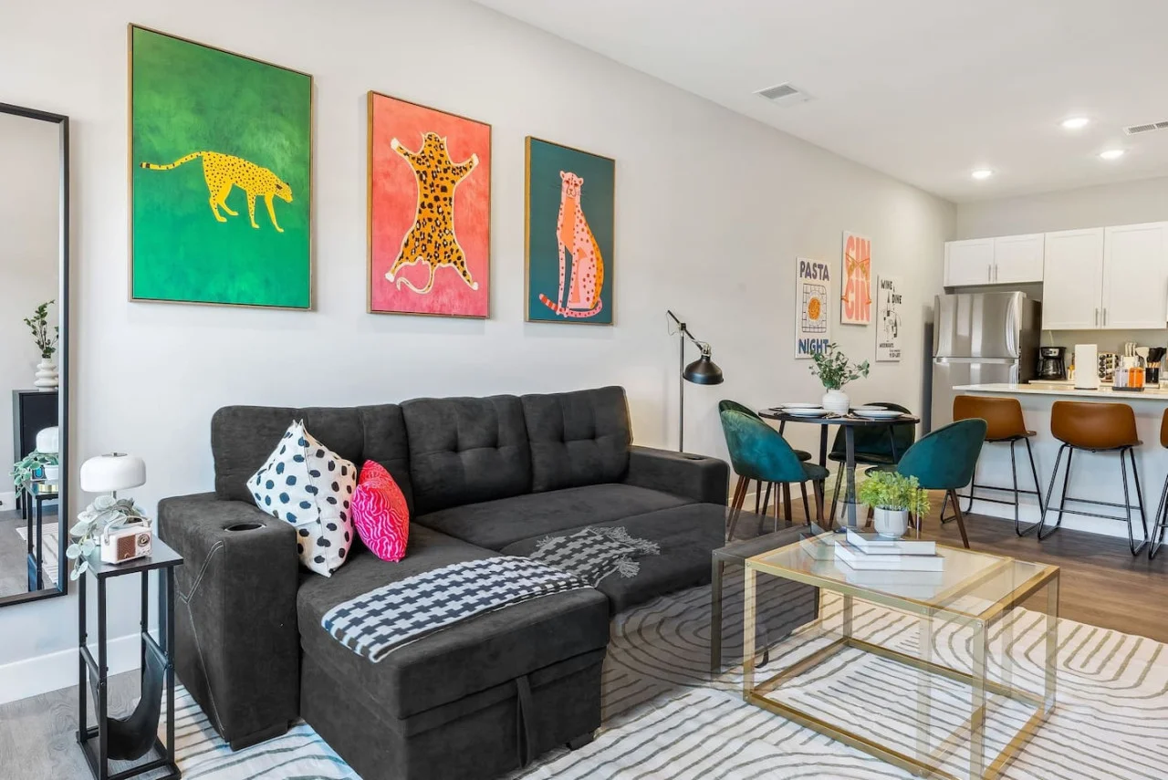 Spacious living room with stylish decor, perfect for unwinding after a day of exploring the local area.