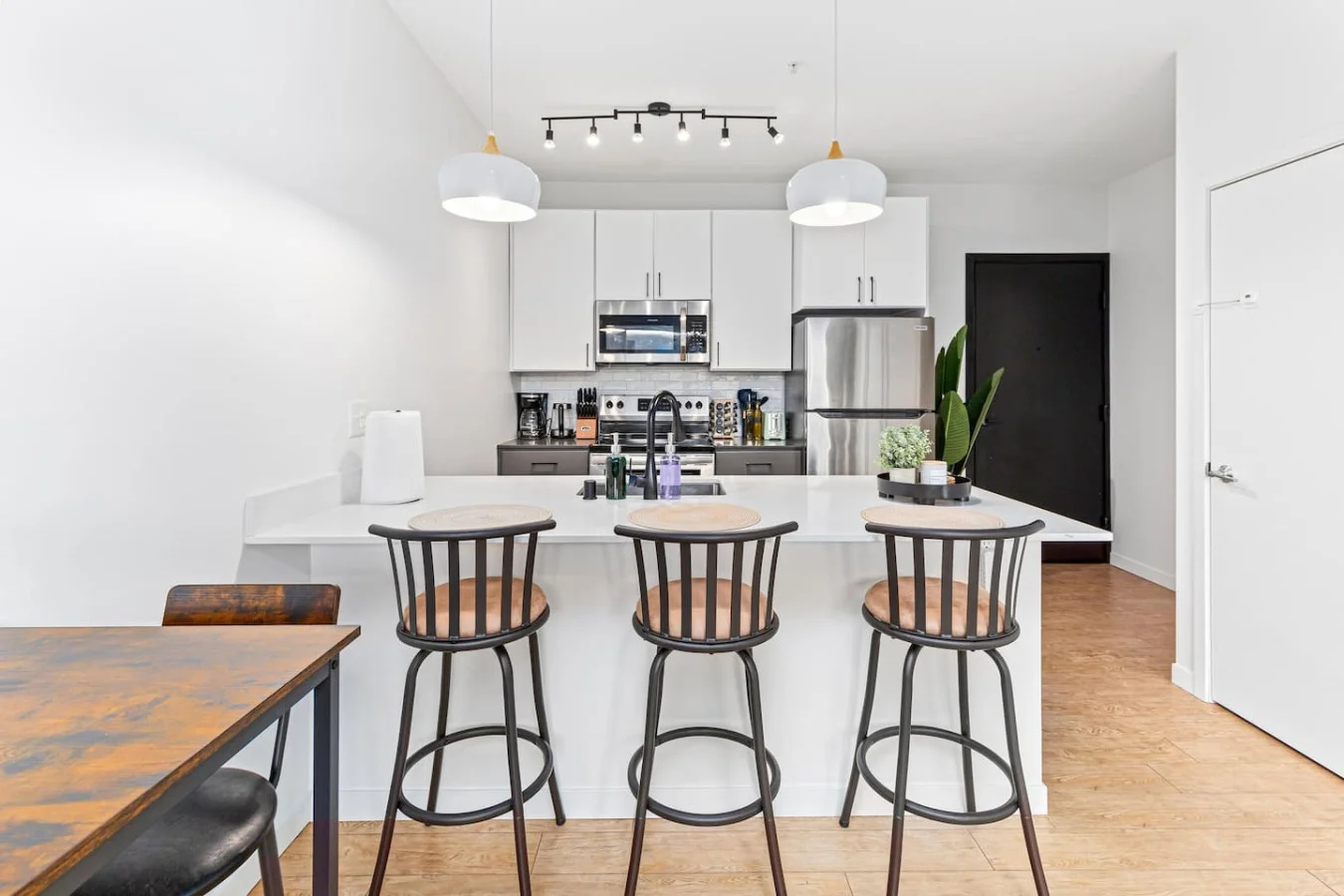 The dining area encourages you to gather with friends, enjoy a drink, and create lasting memories.