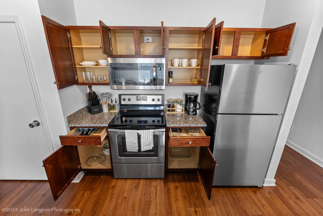 Start your mornings right with a fresh brew from our coffee maker and enjoy cooking with the fully equipped kitchen featuring premium utensils and essentials. Everything you need for a delightful stay is at your fingertips.
