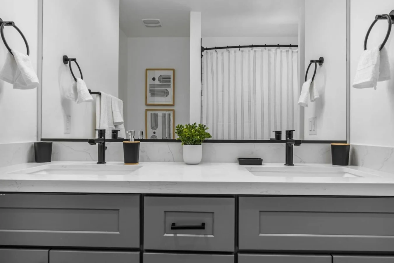 You feel a sense of calm as you enter the bathroom, where the thoughtful design and high-quality materials create a serene environment.