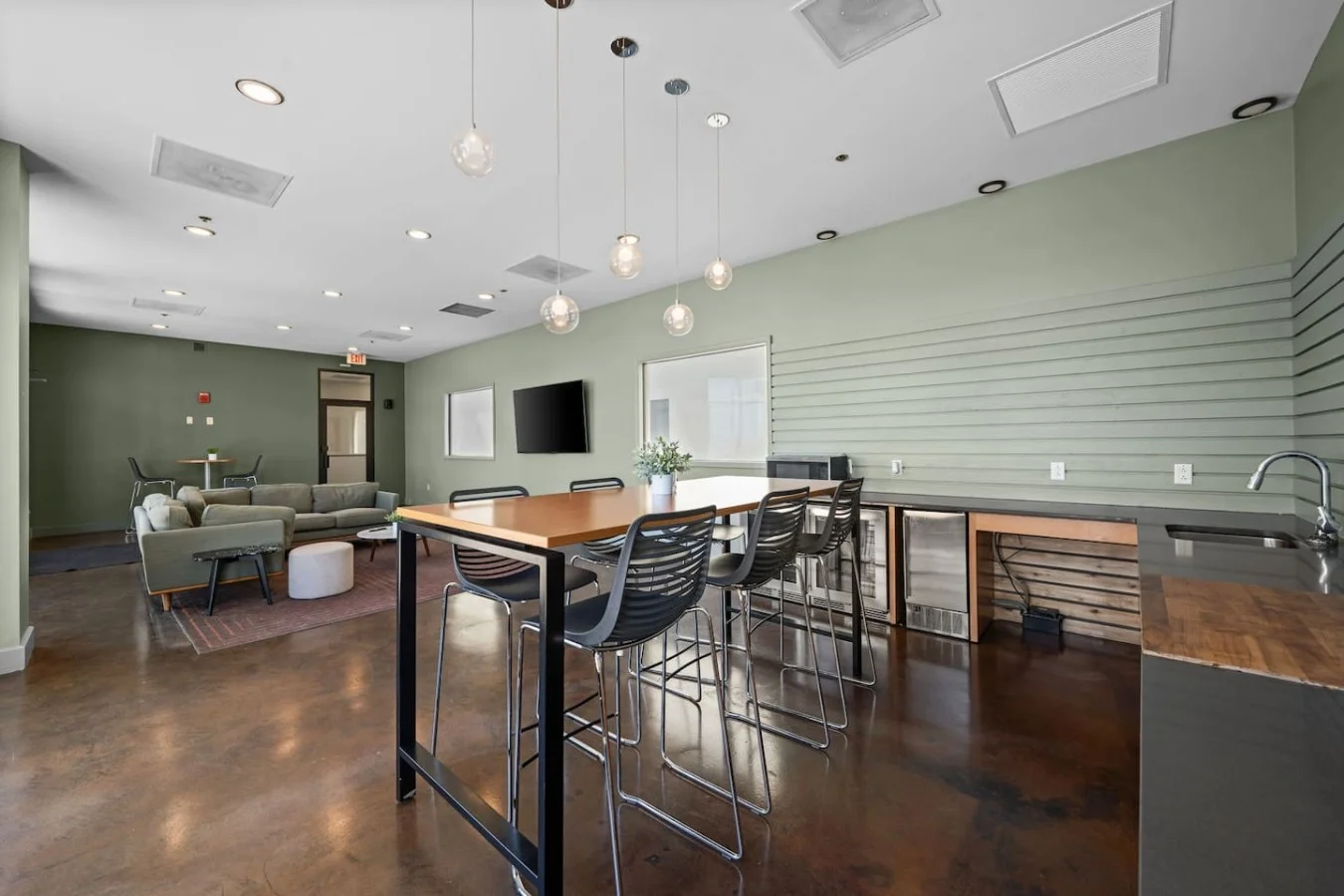 If the temperatures outside don't suit, you can enjoy the rooftop from the adjacent lounge which has seating, a TV screen and a kitchen area