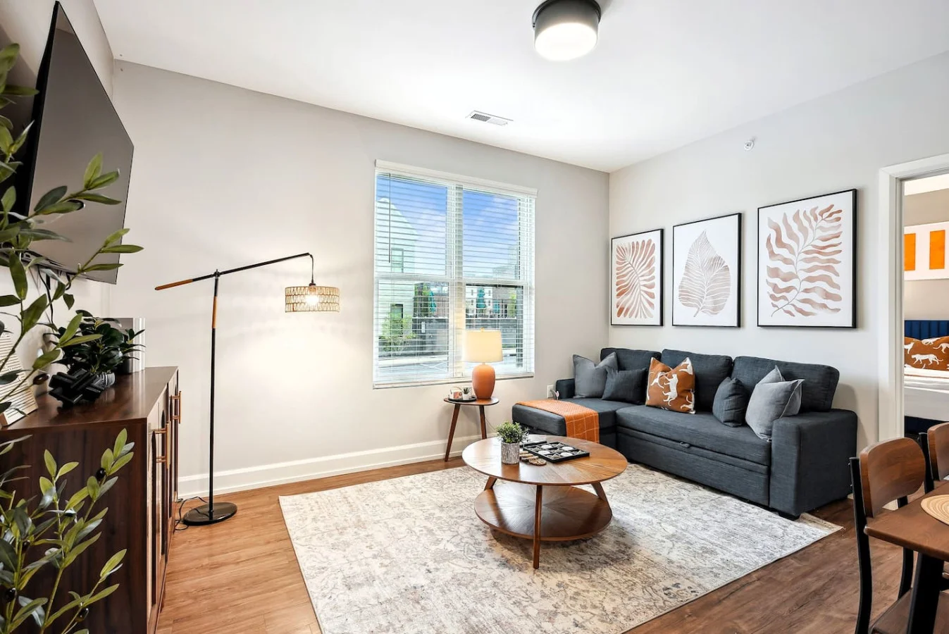 Relax in this warm, inviting space with warm accents and cozy furnishings. You’ll love unwinding on the plush sofa, enjoying or streaming your favorite shows in a serene atmosphere