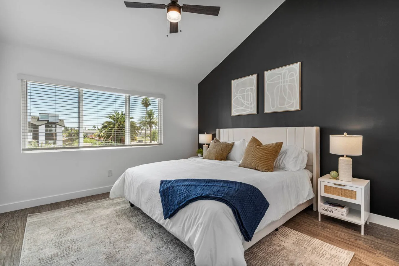 Luxurious king bedroom featuring a comfortable bed, elegant decor, and plenty of natural light for a rejuvenating sleep.