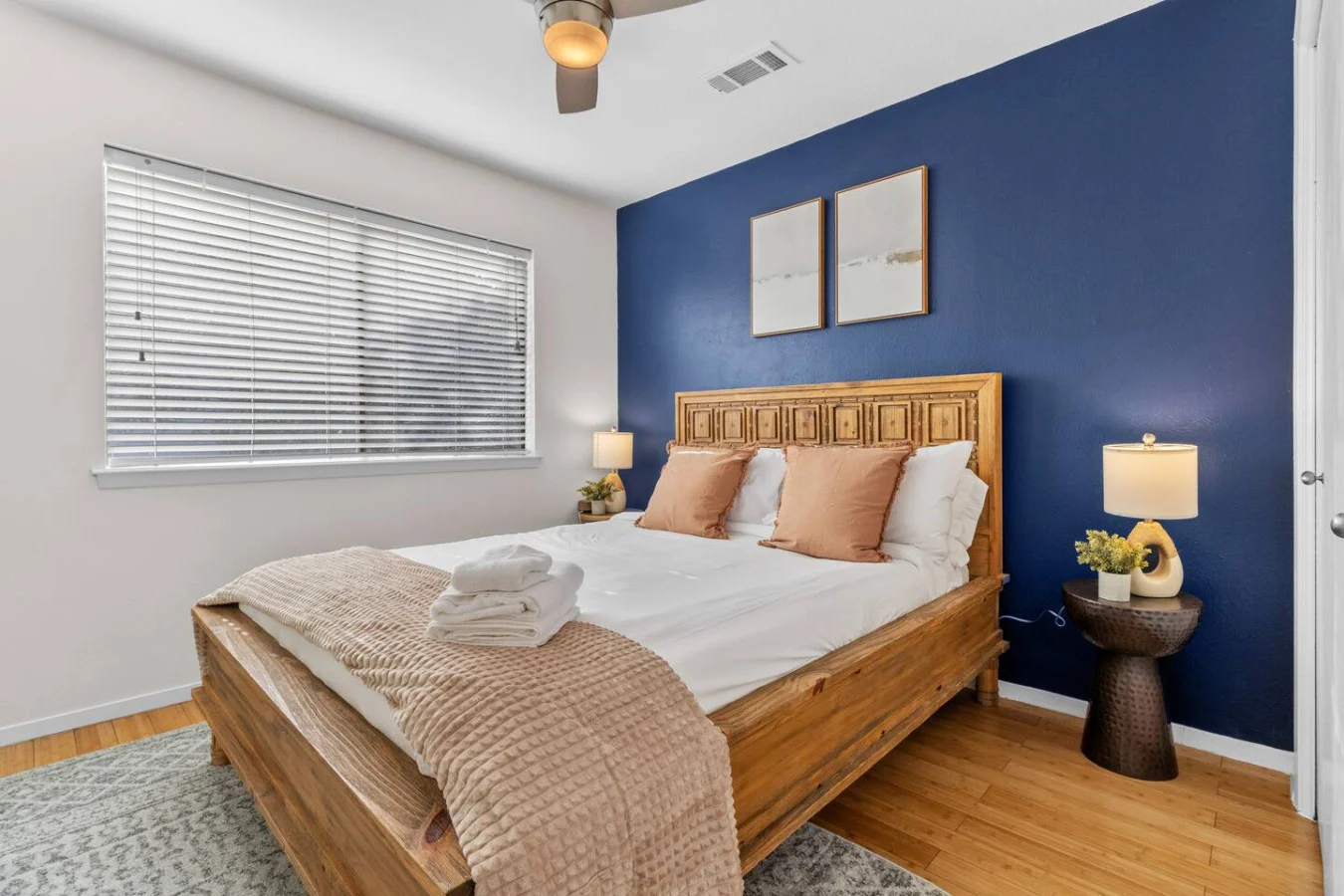 Cozy queen bedroom with warm wood tones