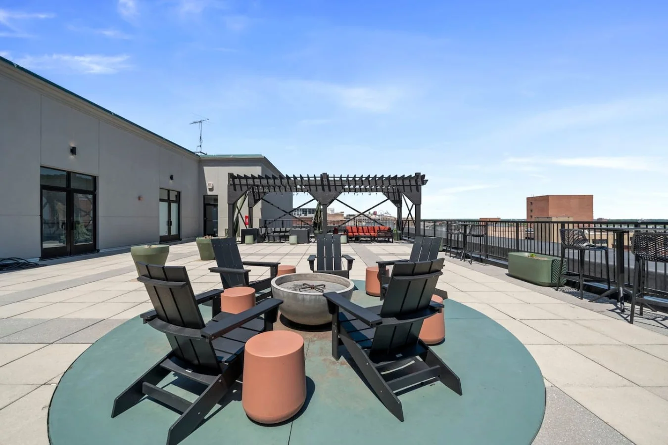 What better way to unwind after exploring the city than at the rooftop firepit with city views