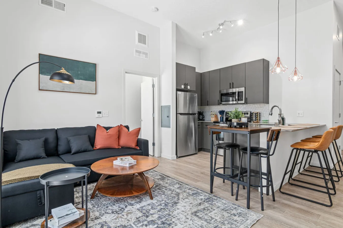 Spacious living room with stylish decor, perfect for unwinding after a day of exploring the local area.
