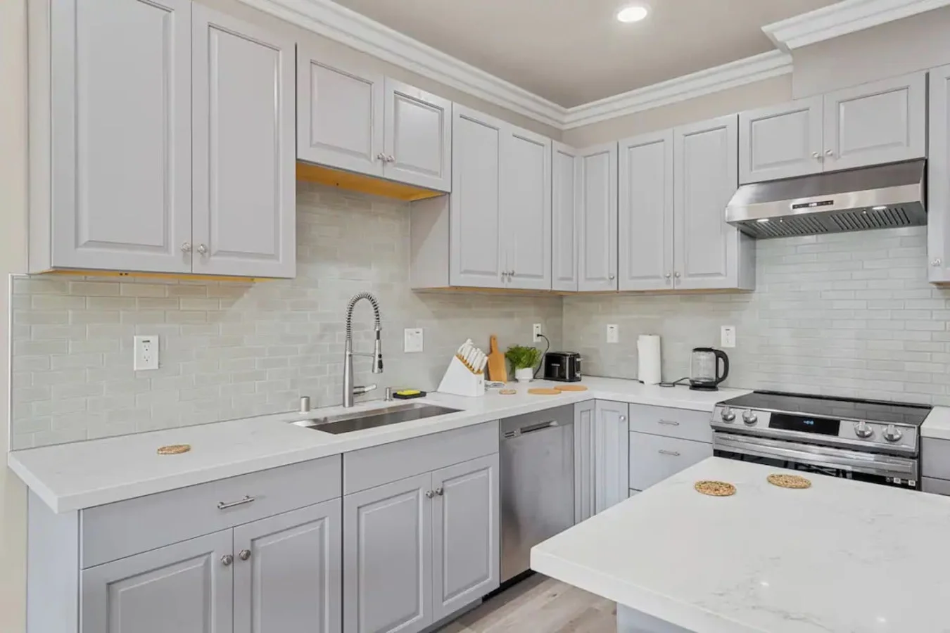 As you step into the kitchen, the clean lines and functional design make you eager to start cooking your favorite dishes.