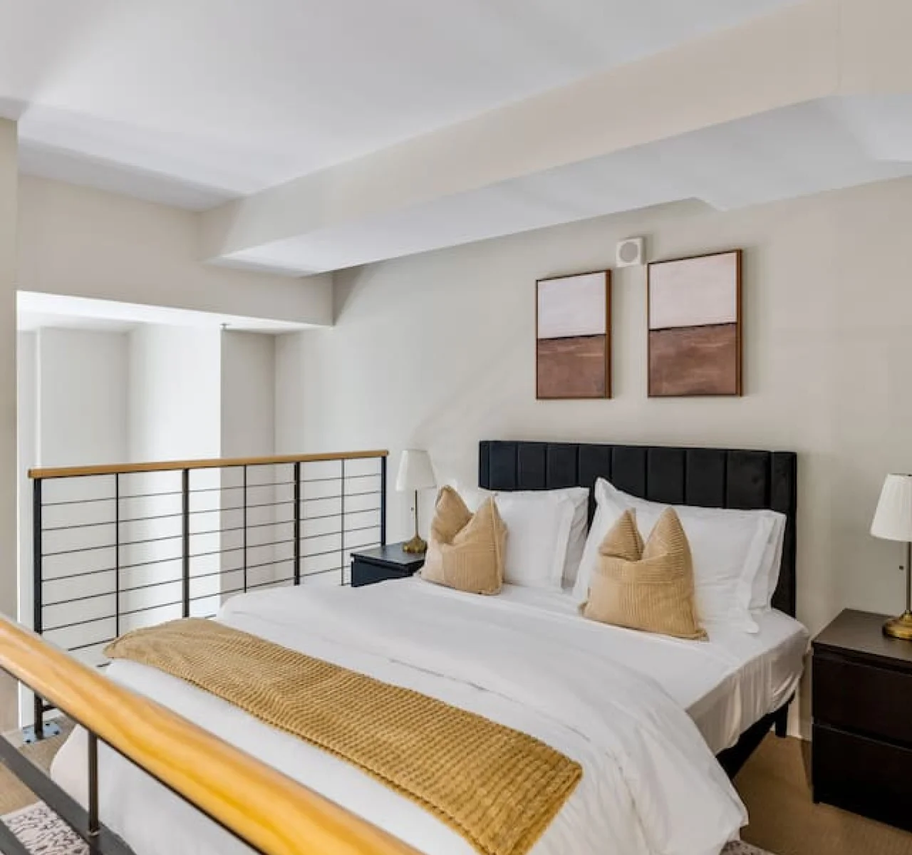 The bedroom’s serene ambiance invites you to relax, with a plush bed that promises a restful night's sleep.
