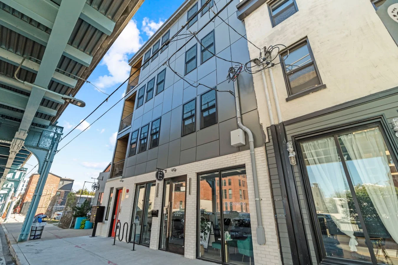 The house’s exterior is a blend of modern and classic design elements, creating a welcoming and stylish facade.