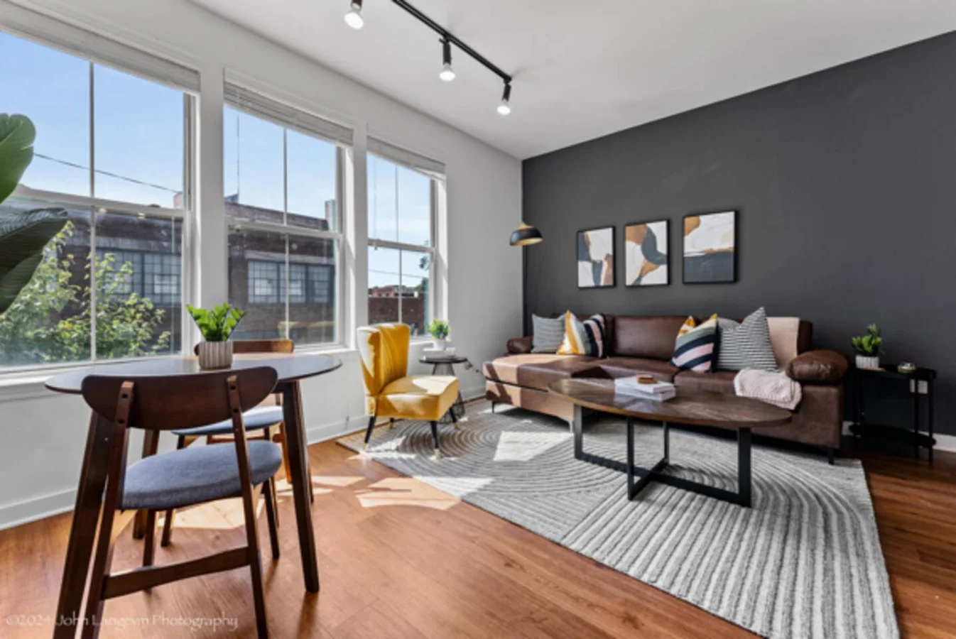 Relax in this warm, inviting space with wooden accents and cozy furnishings. You’ll love unwinding on the plush sofa, enjoying a good book or streaming your favorite shows in a serene atmosphere