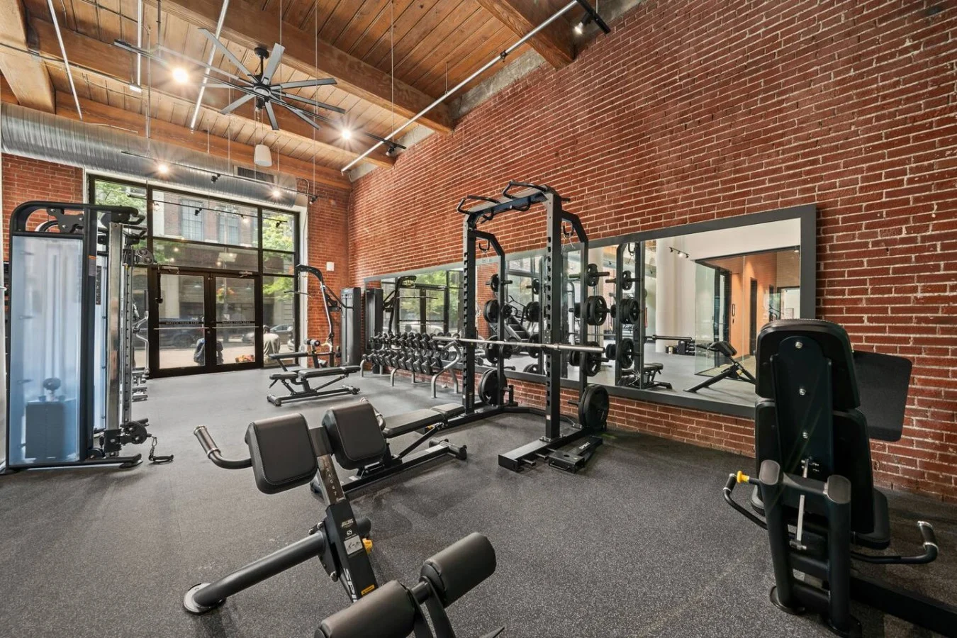 Fully equipped gym with exercise machines and weights accessible 24/7.